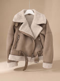 Taupe belted shearling aviator jacket for women shown on a hanger with asymmetrical zip and plush lining