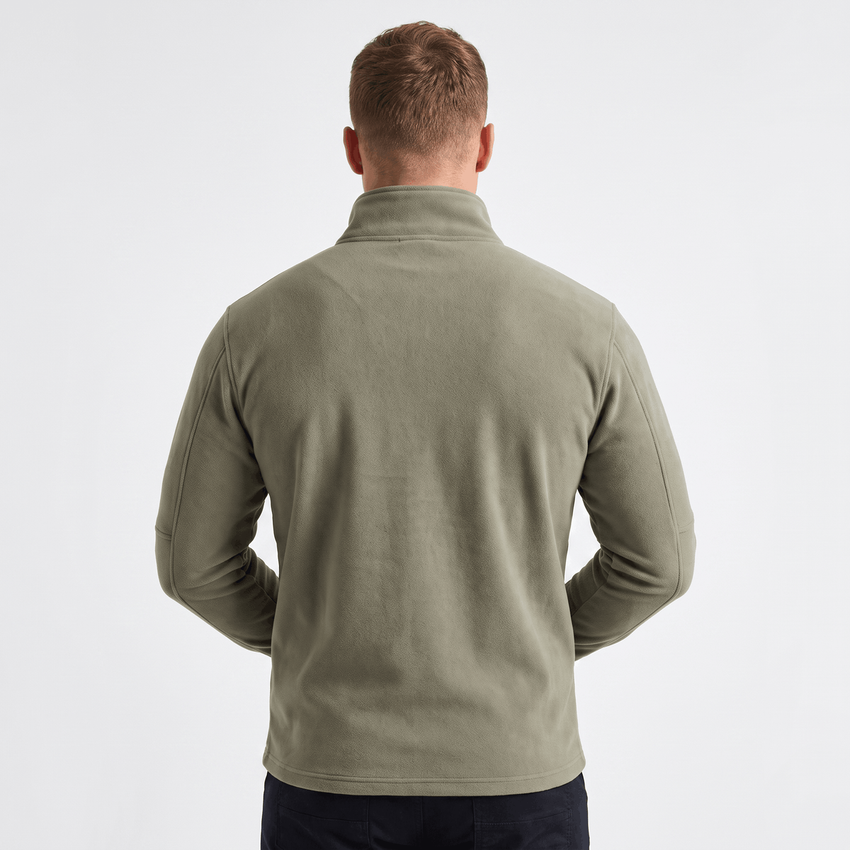 Back view of a men's olive green quarter-zip knit sweater featuring a stand collar, ribbed cuffs, and hem.