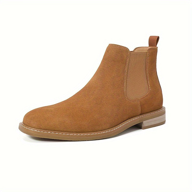 Side profile of a tan suede Chelsea ankle boot for men with elastic side panel and pale contrast sole