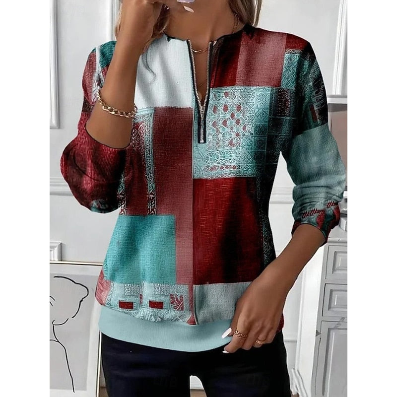 Red, Teal, and Black color block quarter-zip pullover sweater with long sleeves