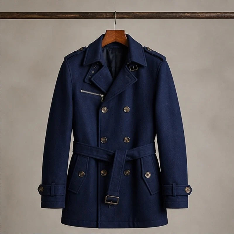 A navy blue cotton blend trench coat with a belted waist and double-breasted front, shown flat