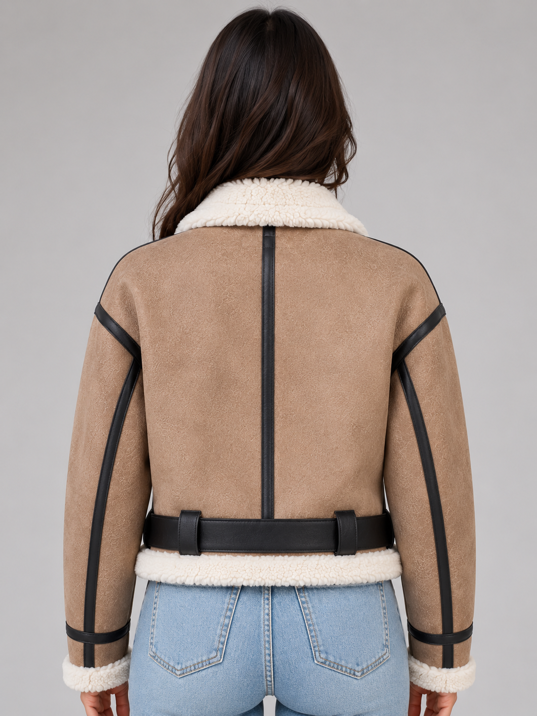 Beige cropped shearling aviator jacket for women worn by a female model, back view with teddy lining
