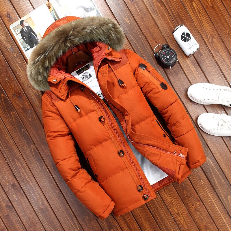 Orange quilted duck down winter parka with plush-trim hood displayed flat