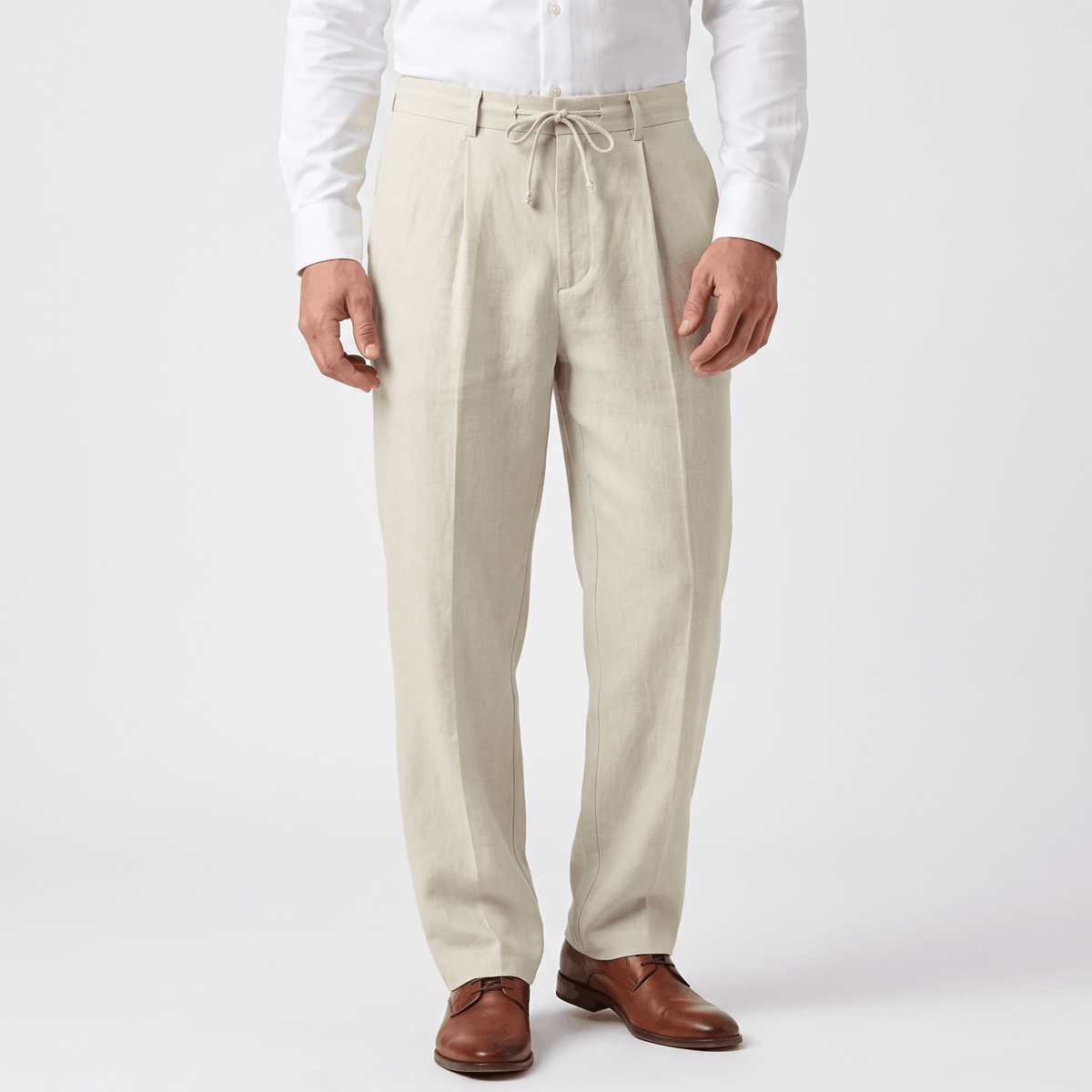Men's cream linen drawstring pants with a relaxed straight-leg fit, elastic waistband, adjustable drawstring, and side pockets.