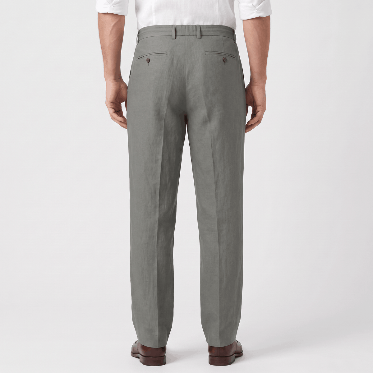 Back view of men's gray linen drawstring pants with an elastic waistband, relaxed fit, and lightweight linen construction.
