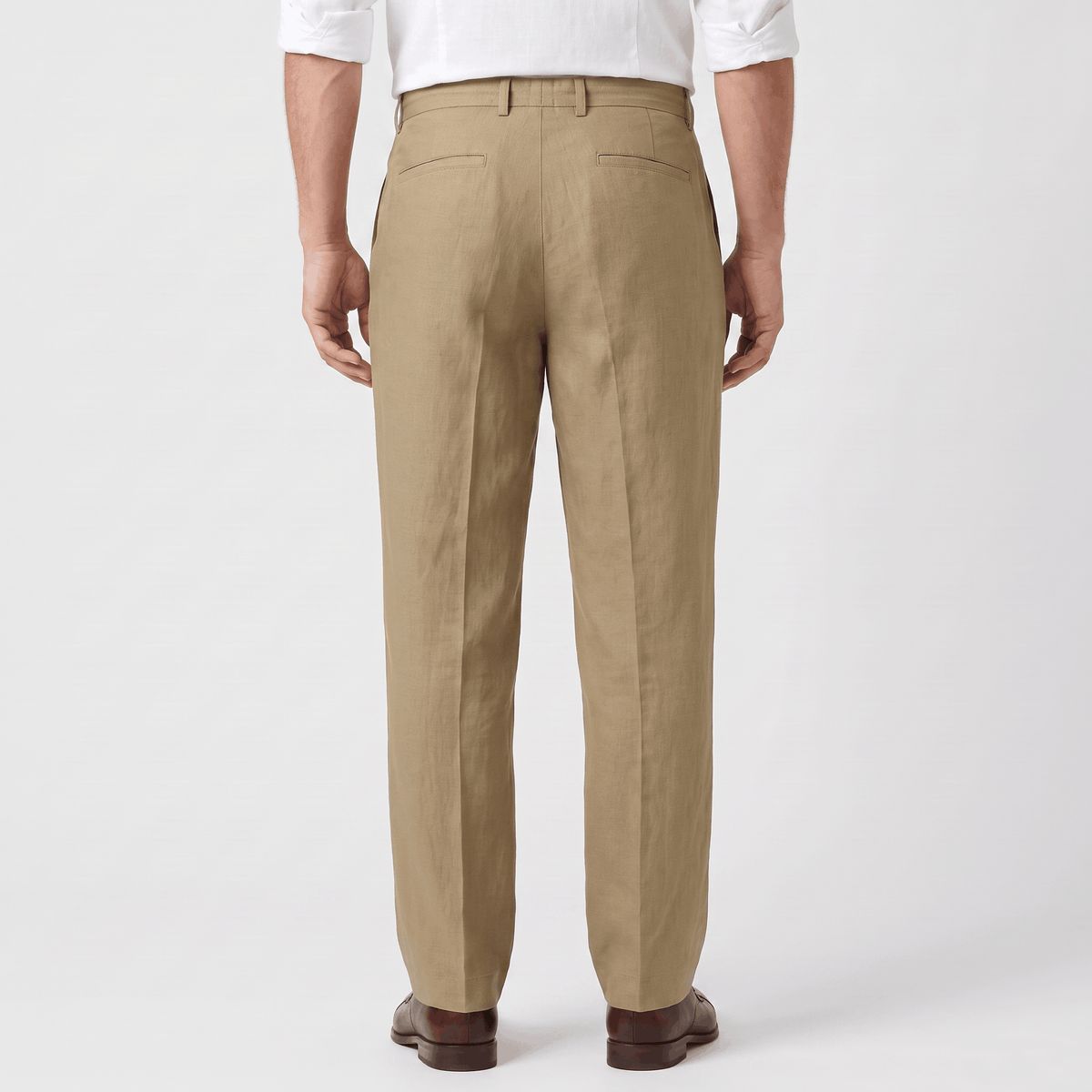 Back view of men's khaki linen drawstring pants with an elastic waistband and breathable linen construction.