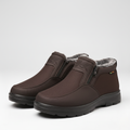 Brown fleece-lined snow boots with a side zip and slip-resistant sole, shown as a pair
