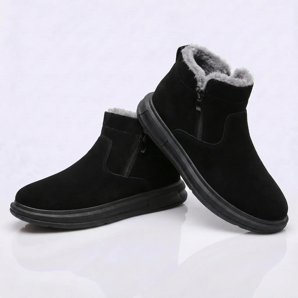 Pair of black fleece-lined winter ankle boots with cushioned soles and wide toe boxes
