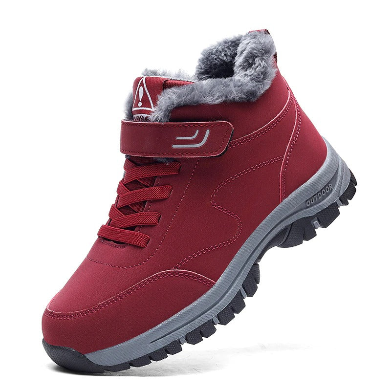 Red fleece-lined winter hiker boot with a hook-and-loop strap and rugged anti-slip sole