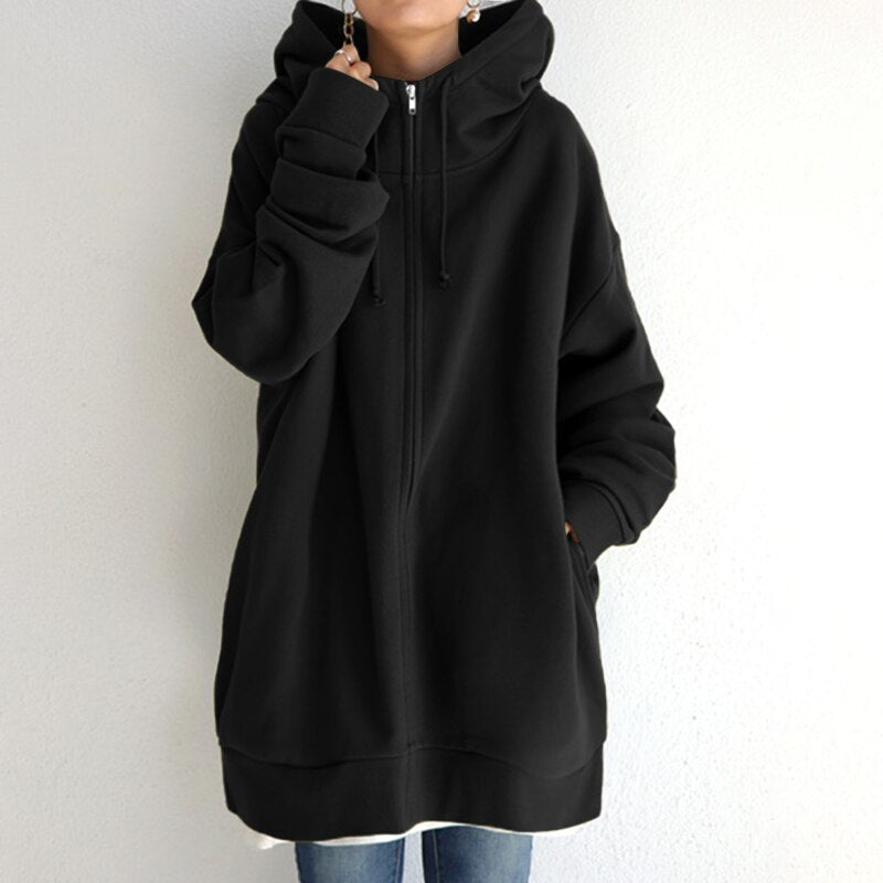 Black longline oversized drop shoulder fleece zip-up hoodie worn by a model, front view