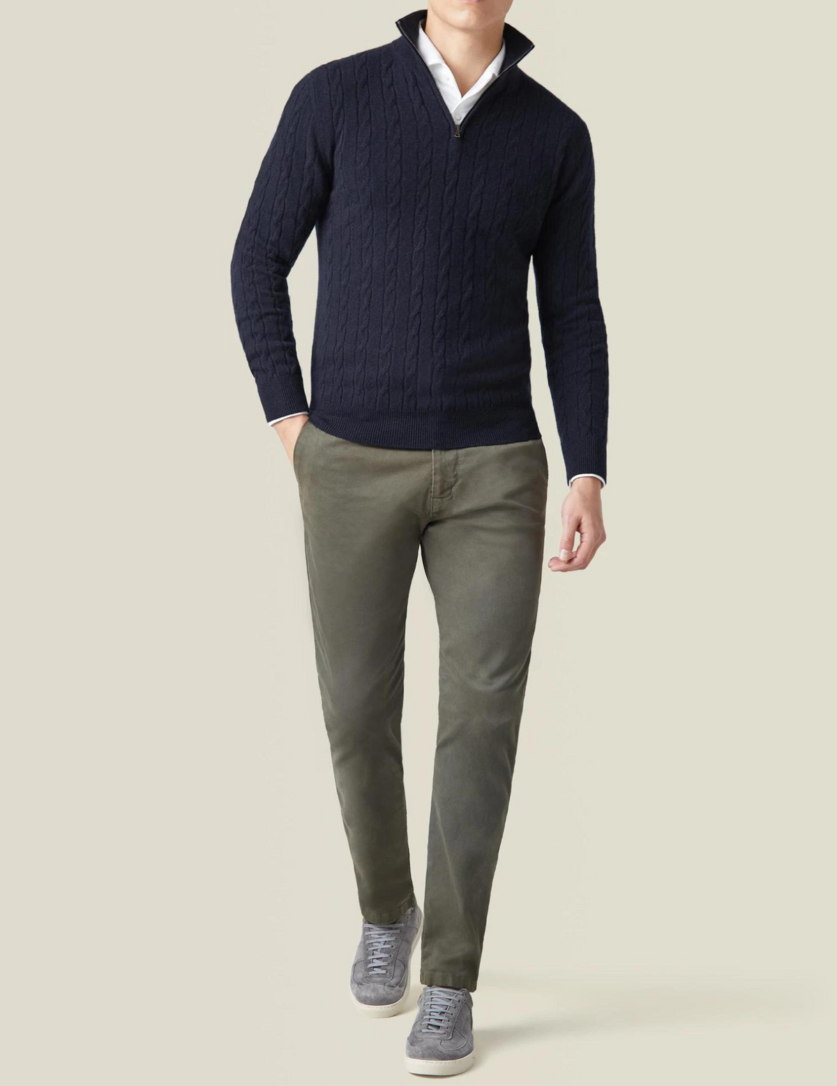 Dark Blue cable knit V-neck sweater worn by a male model with gray pants, shown in a full-body view