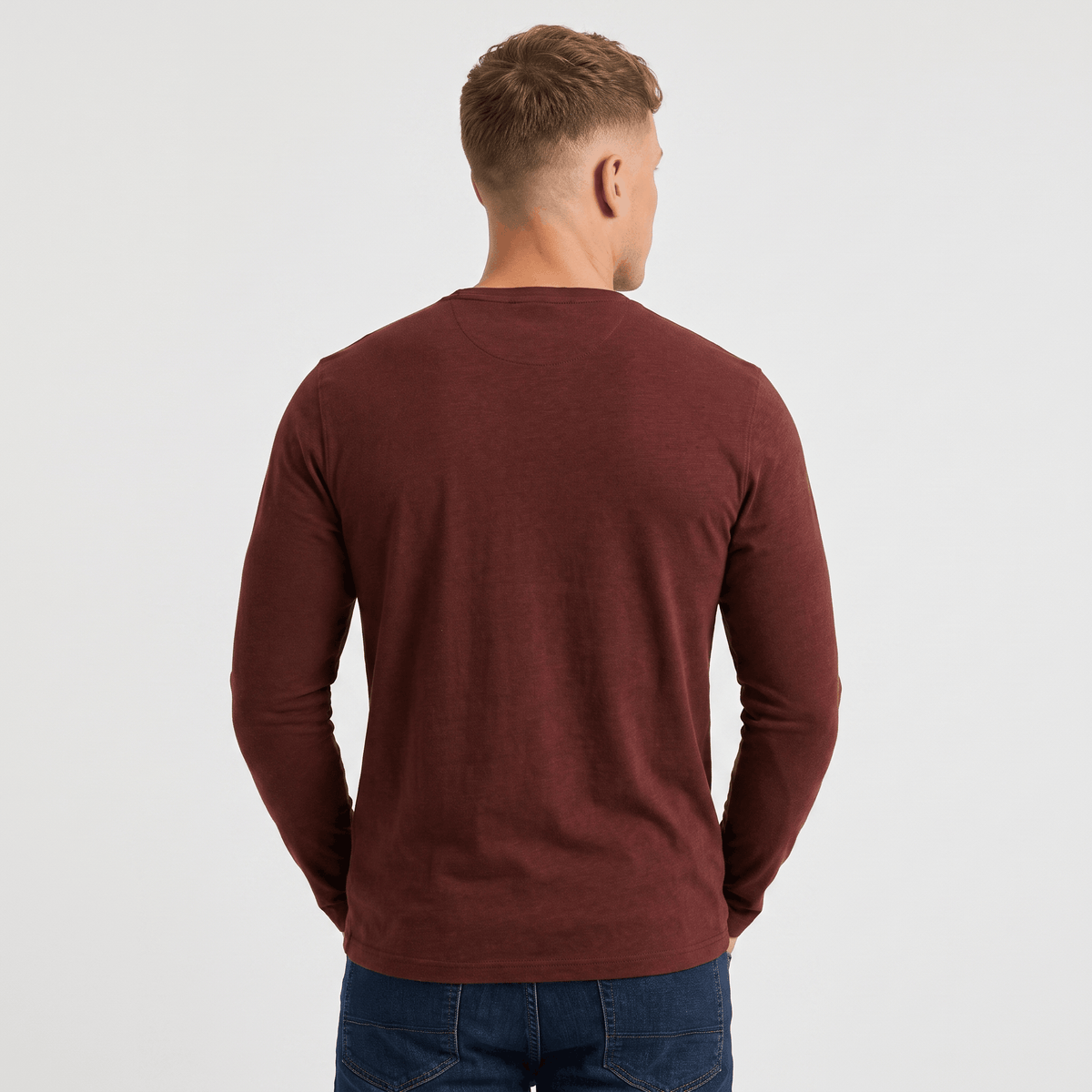Back view of a men's burgundy long-sleeve Henley shirt with a classic fit and clean minimalist design.