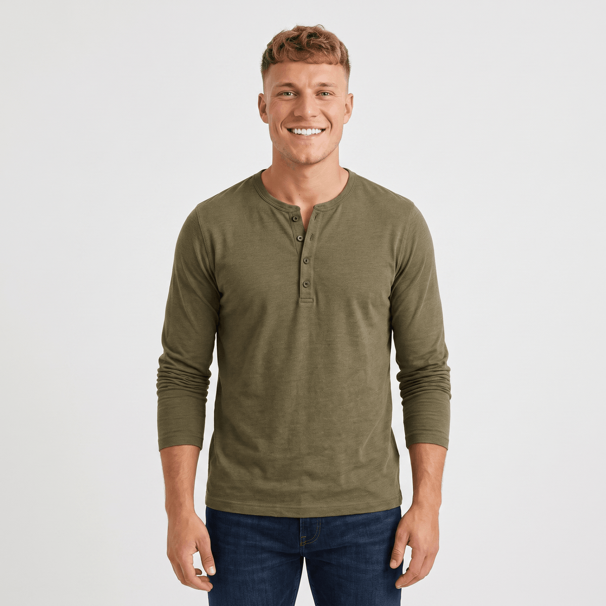 Man wearing an olive green long-sleeve Henley shirt featuring a three-button neckline and classic fit.