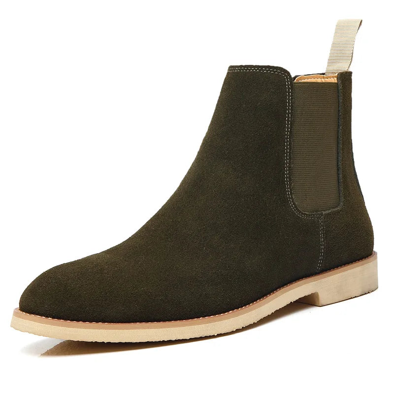 Single dark olive green Suede Chelsea boot with an elastic side panel, rear pull tab, and light-colored sole.