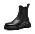 Black leather Chelsea ankle boot for women with cap-toe seam, square heel and deep lug sole