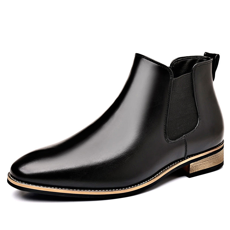 Single black leather Chelsea boot with an elastic side panel, pointed toe, and low stacked heel.