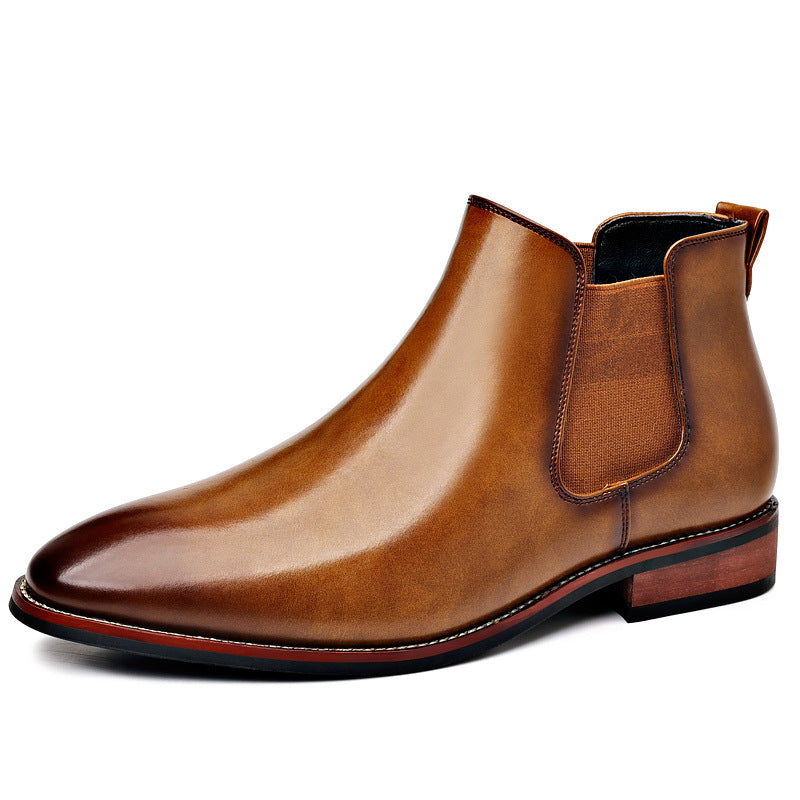 Single brown leather Chelsea boot with an elastic side panel, pointed toe, and low stacked heel.