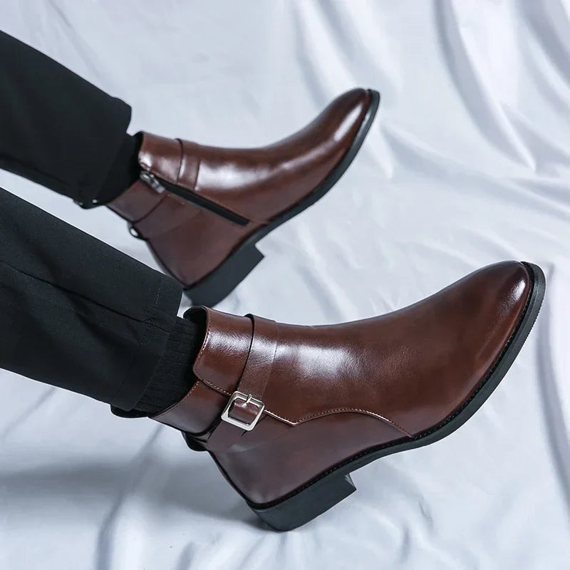 Person wearing dark brown leather ankle boots with side buckles, showing the polished finish and ankle fit.