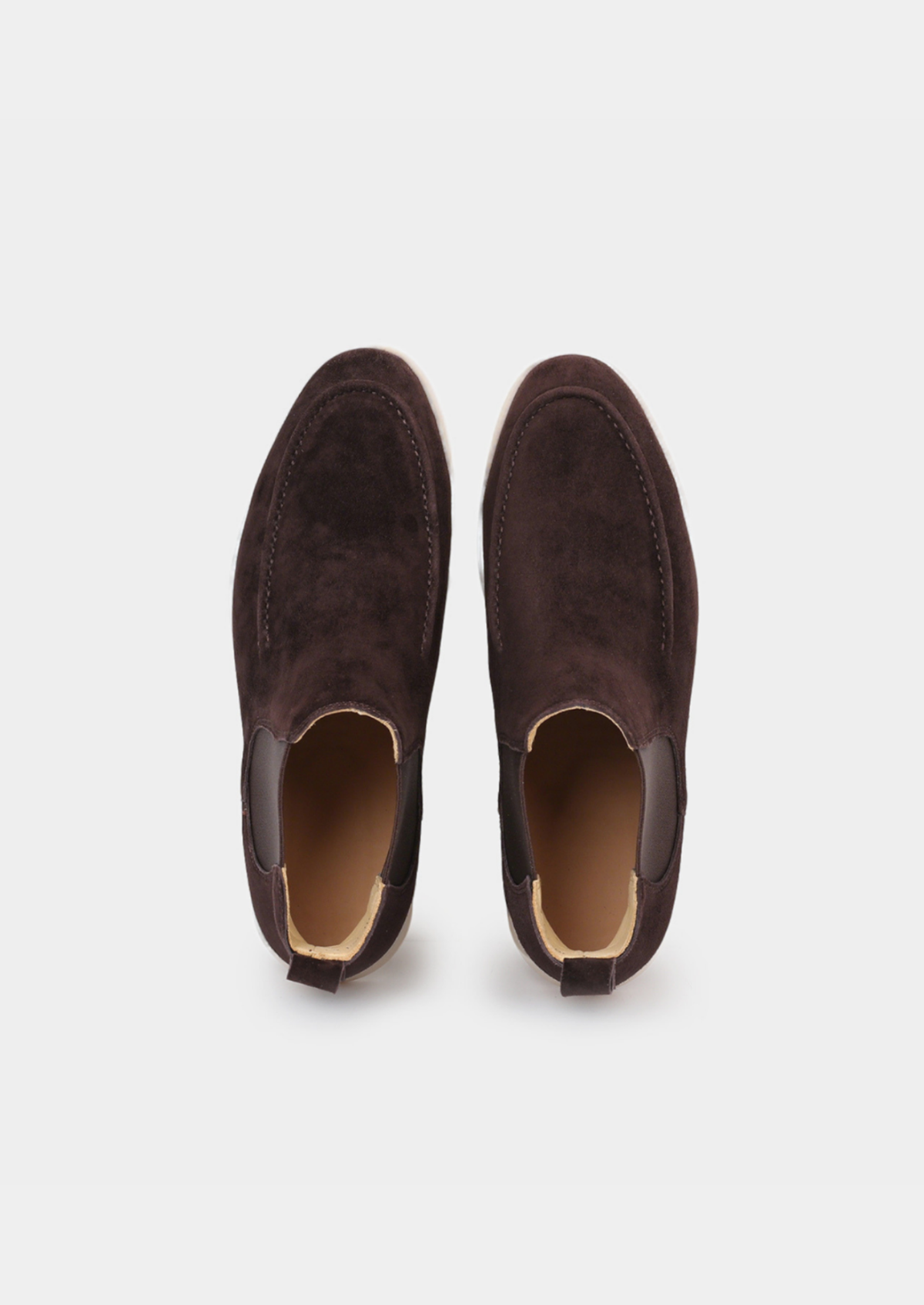Single dark brown suede Chelsea boot showing the sleek profile and elastic side panel.