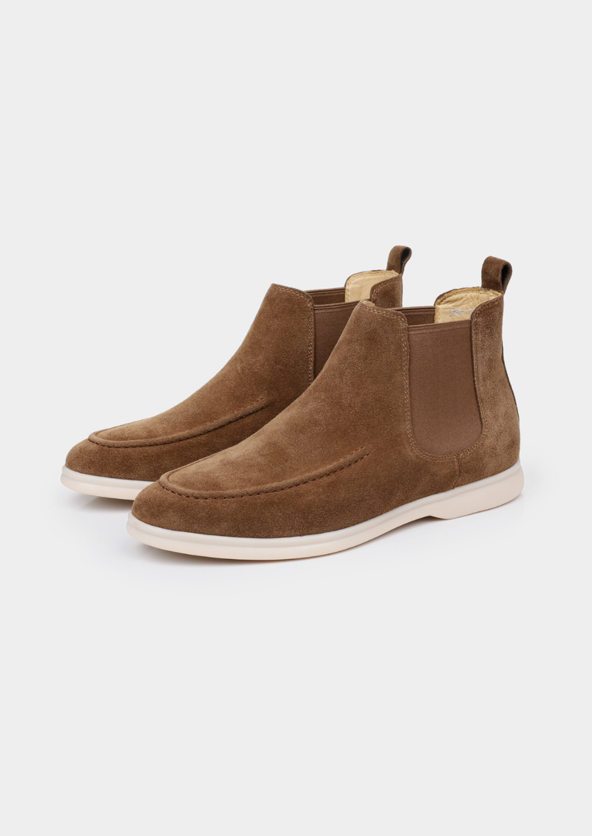 Pair of brown suede Chelsea boots displayed on a white background, showing the side profile and smooth finish.