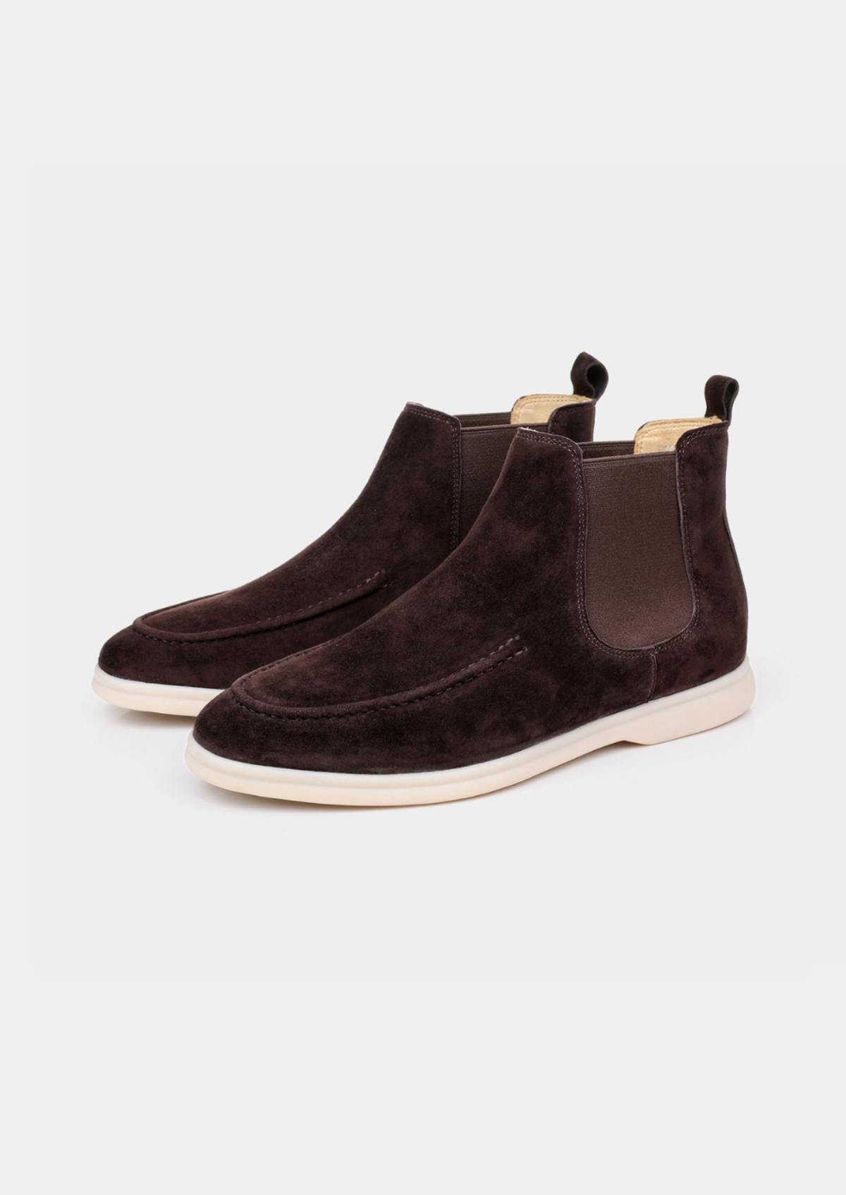 Pair of dark brown suede Chelsea boots displayed on a white background.