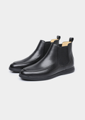 Pair of black Chelsea boots with elastic side panels, pull tabs, smooth uppers, and low-profile soles.