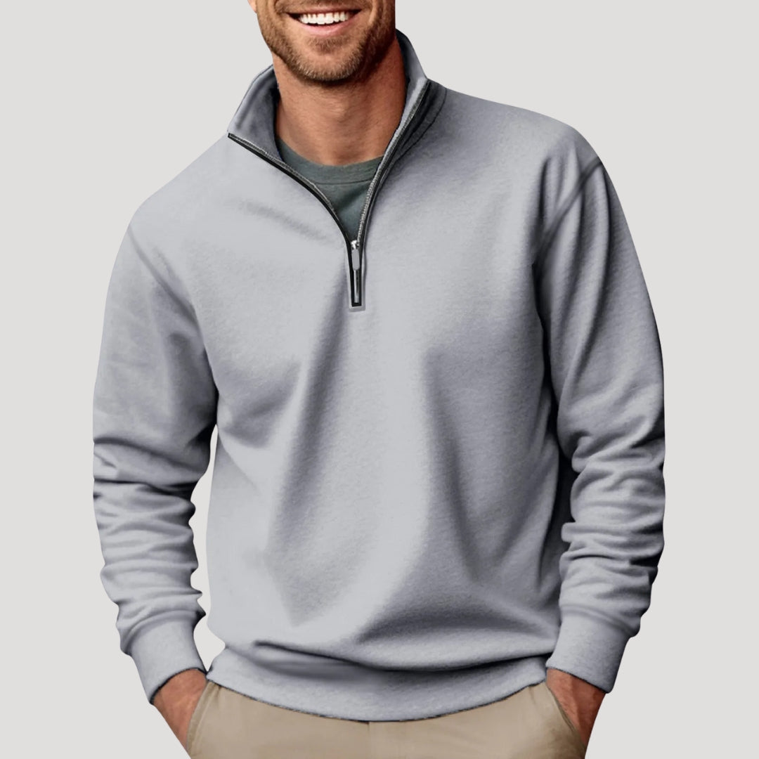Light Gray quarter-zip pullover sweatshirt worn by a male model with long sleeves and ribbed hem