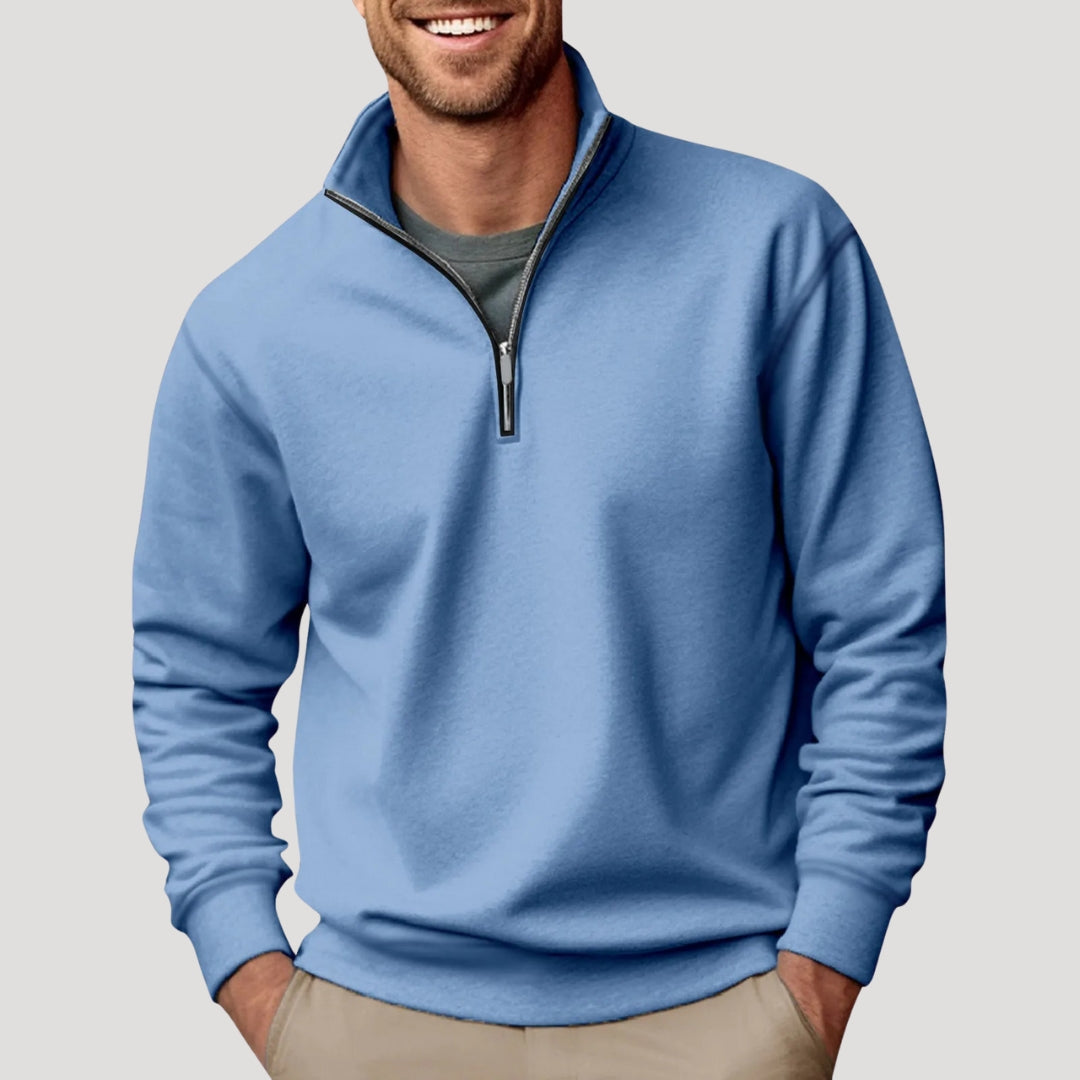 Light Blue quarter-zip pullover sweatshirt worn by a male model with long sleeves and ribbed hem