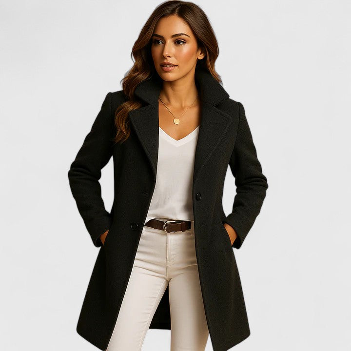 A woman wearing a black long wool coat with a slim fit and notch collar