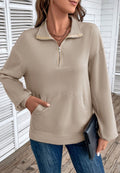Taupe loose fit quarter-zip sweater with a collared neckline, long sleeves, and relaxed silhouette