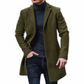 A man wearing an olive green mid-length wool coat with a single-breasted front and tailored fit, front view