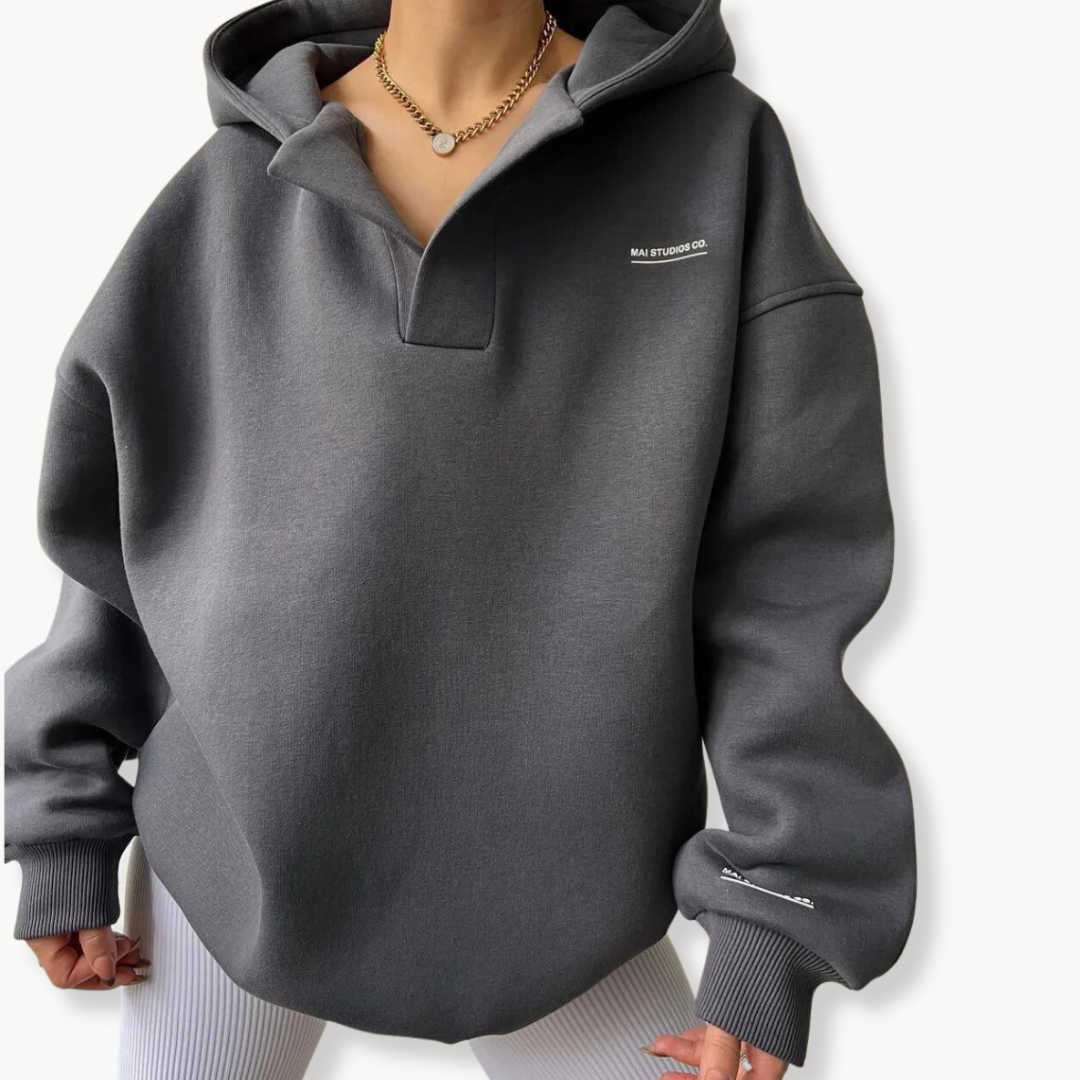 Gray oversized fleece hoodie for women with a drop shoulder, collared neckline, and relaxed fit