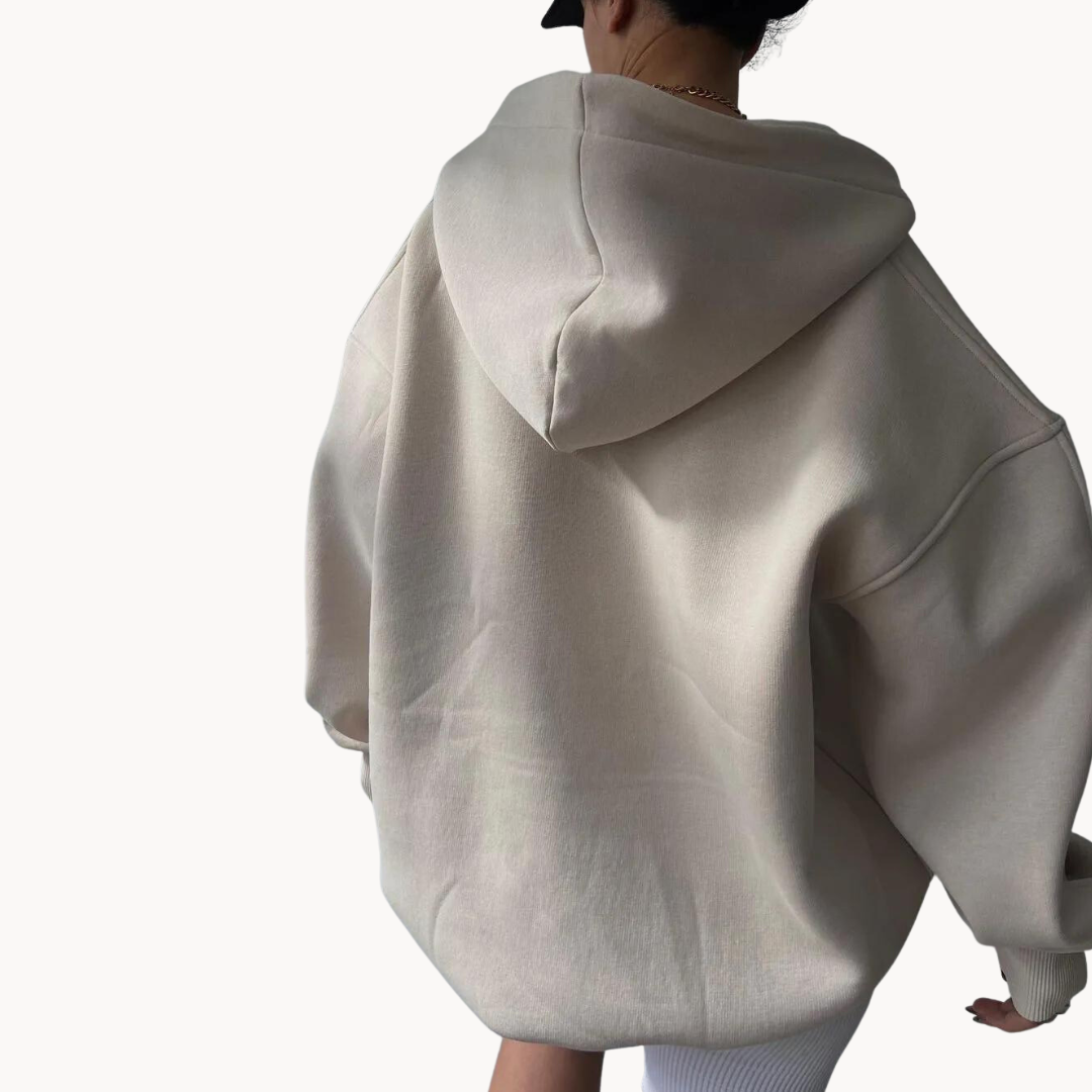 Light Beige oversized fleece hoodie for women shown from the back, featuring a drop shoulder and hood