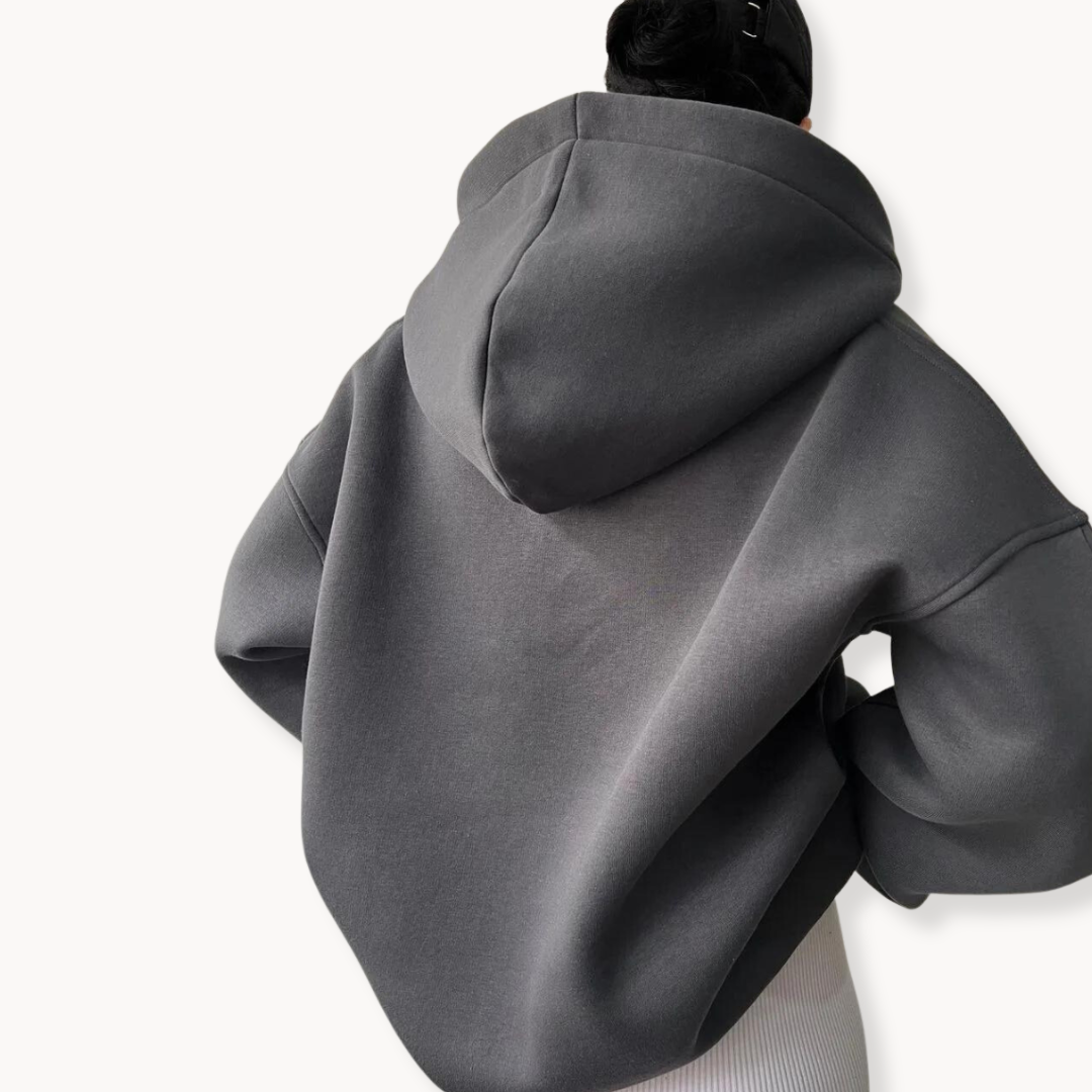 Gray oversized fleece hoodie for women shown from the back, featuring a drop shoulder and hood