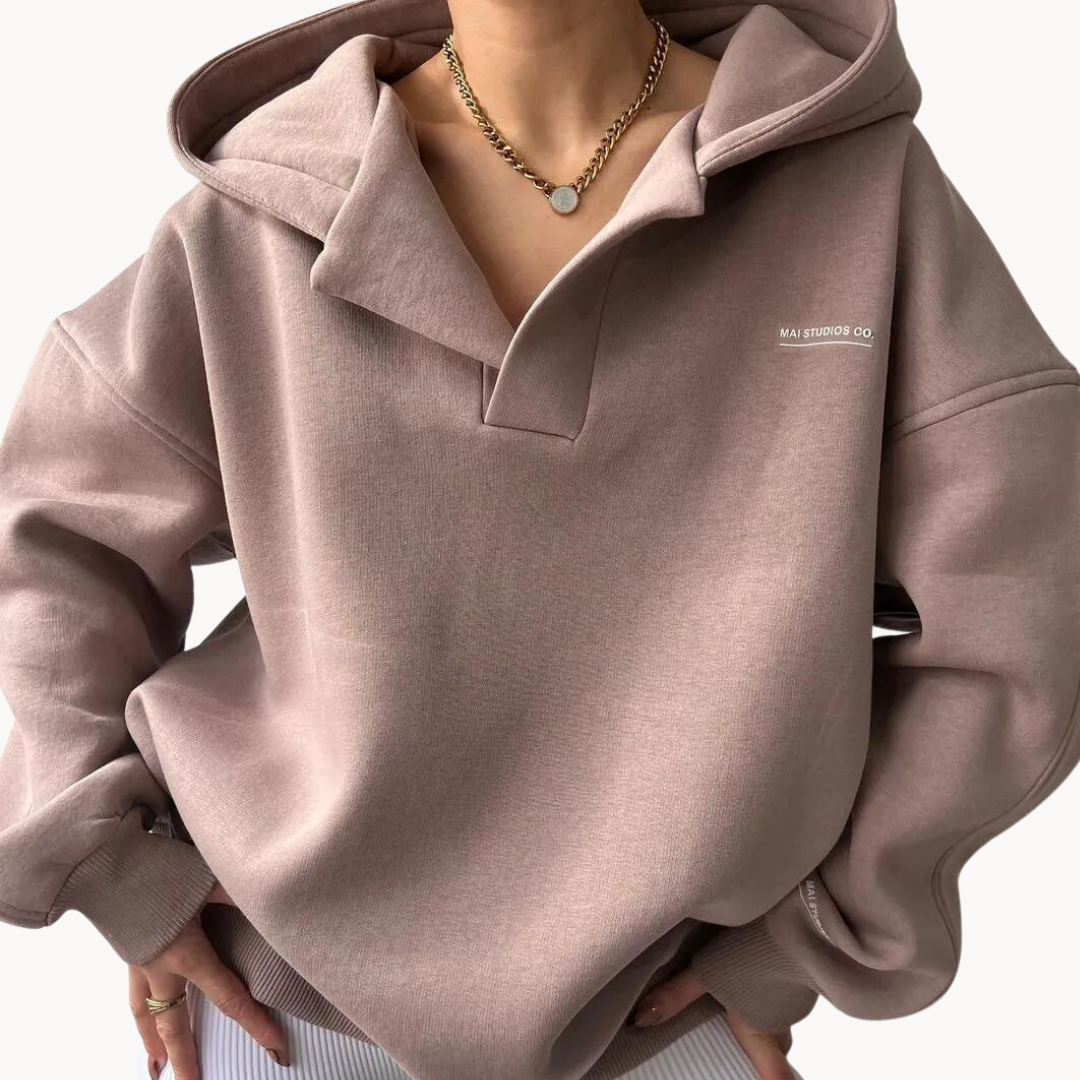 Rose Pink oversized fleece hoodie for women with a drop shoulder, collared neckline, kangaroo pocket, and relaxed fit