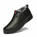 Black plush-lined slip-on winter boot with lightweight construction and non-slip sole