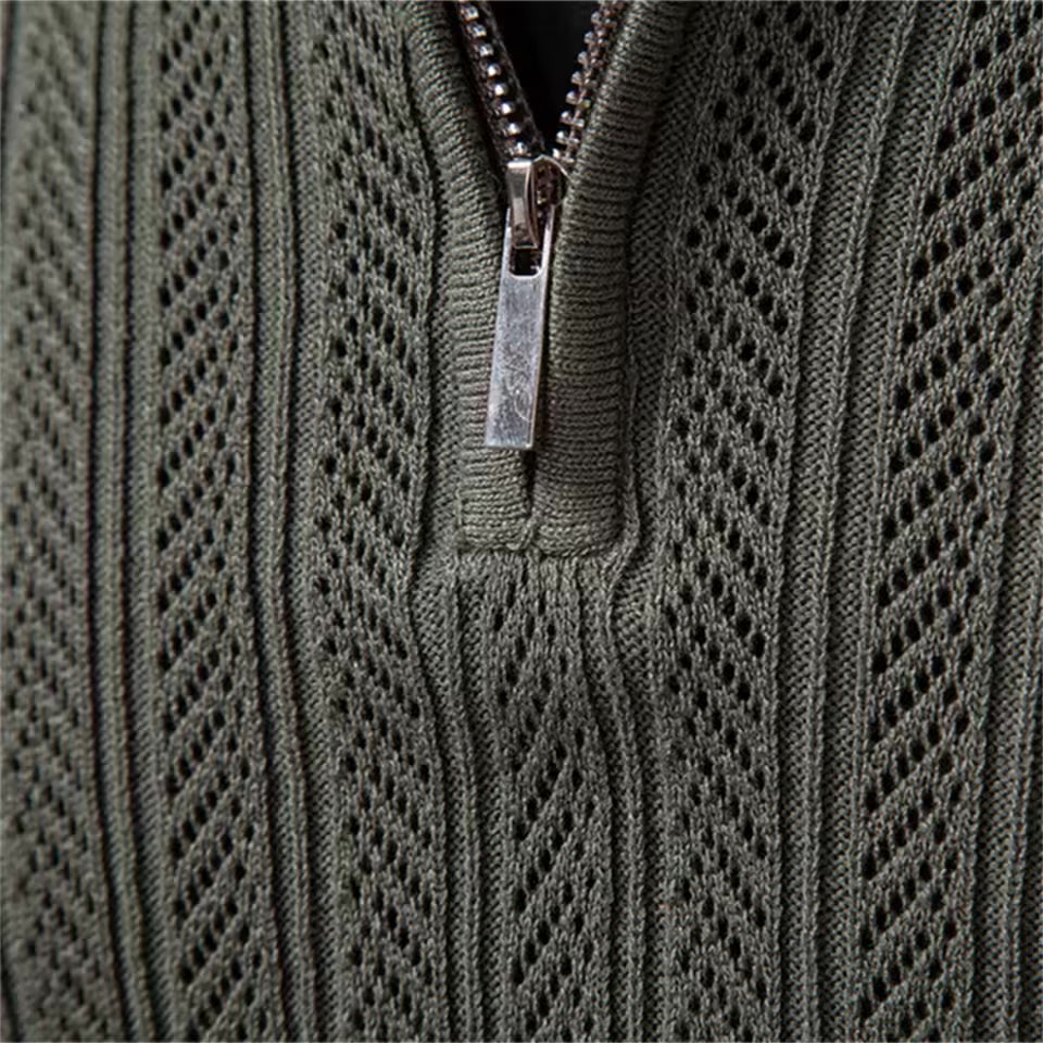 Dark Olive cable knit quarter-zip sweater close-up showing the textured knit pattern and zipper
