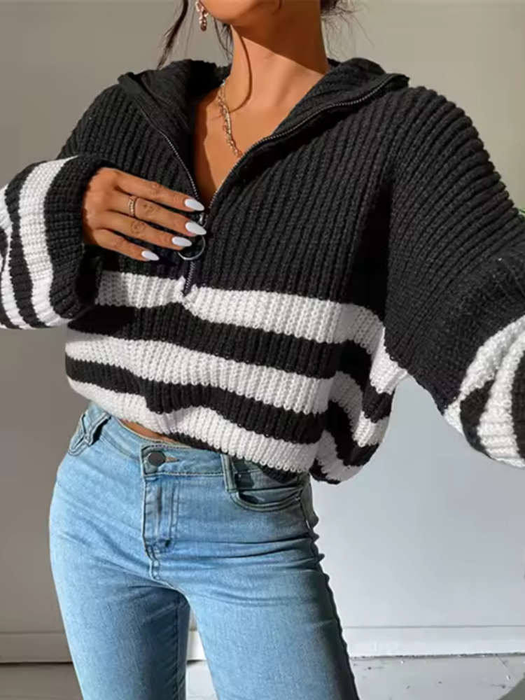 Black and White striped relaxed fit half-zip sweater worn by a female model, front view