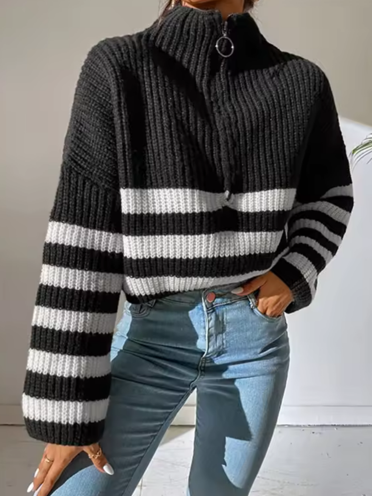 Black and White striped relaxed fit half-zip sweater worn by a female model, three-quarter view