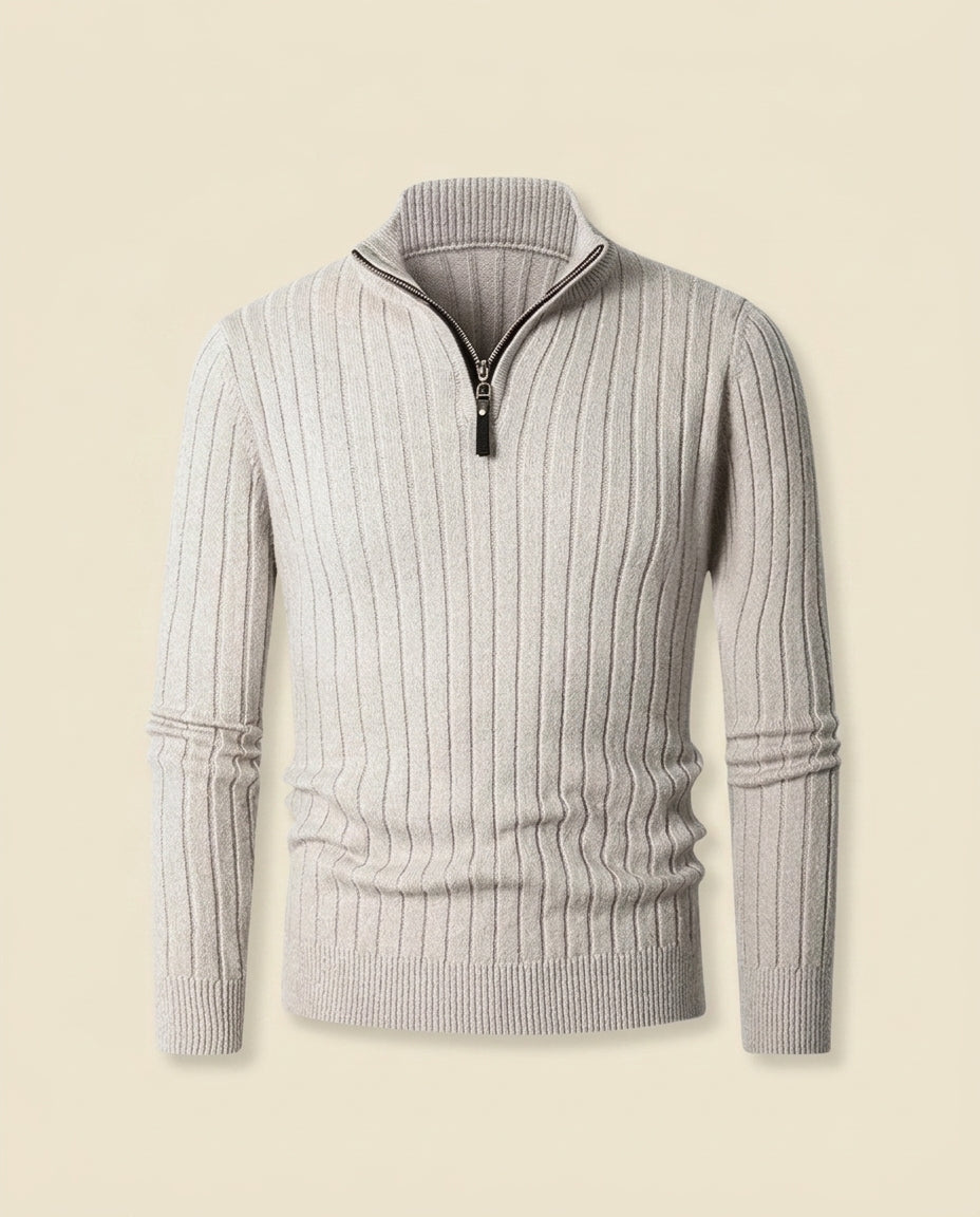 Gray ribbed quarter-zip sweater with a high collar, long sleeves, and textured knit fabric