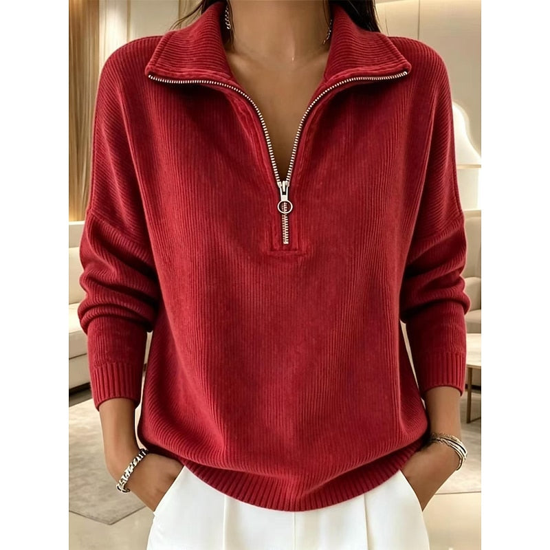 Red quarter-zip pullover sweater with a soft textured finish, long sleeves, ribbed cuffs, and hem