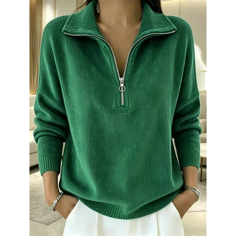 Green quarter-zip pullover sweater with a soft textured finish, long sleeves, ribbed cuffs, and hem