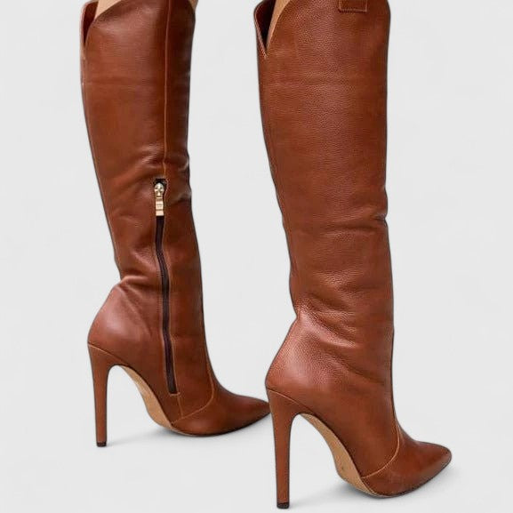 Brown leather thigh-high boots with tall stiletto heels.