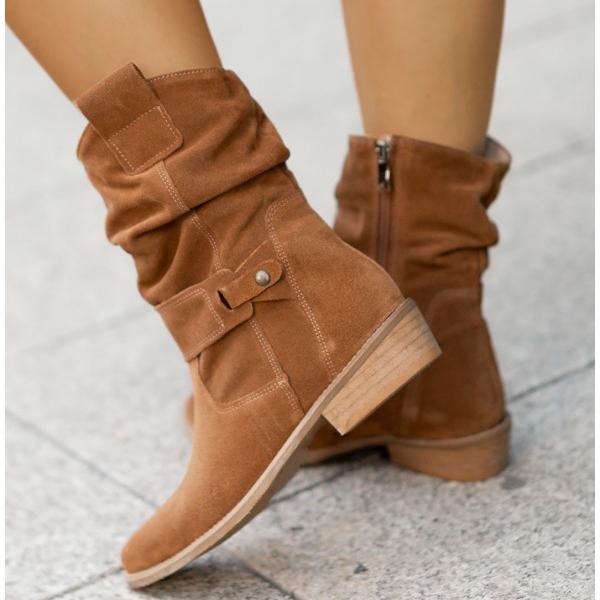 Brown suede slouchy ankle boots with buckle details and block heels.