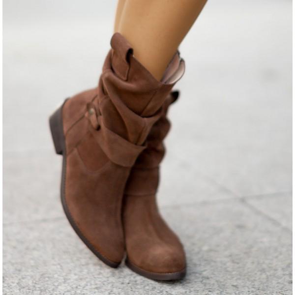 Brown suede slouchy ankle boots with folded shafts and block heels.