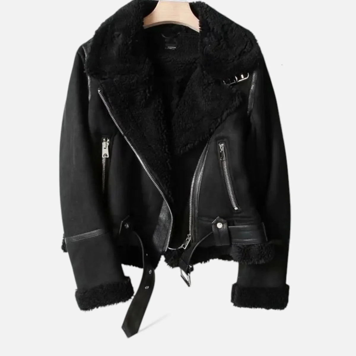 A black suede shearling aviator jacket with a belted waist, asymmetric zip front, and plush shearling lining, shown flat