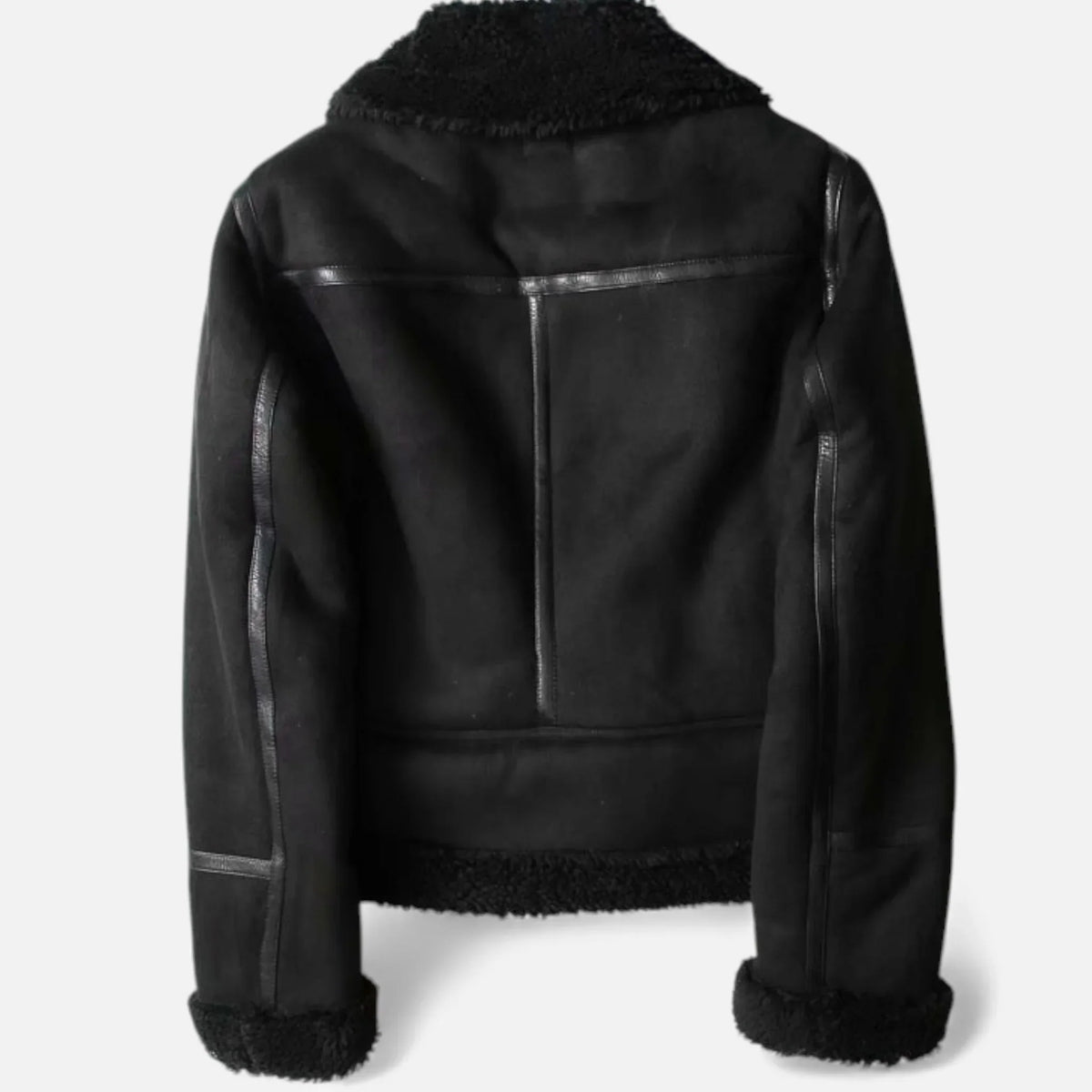 A black suede shearling aviator jacket with a belted waist and plush shearling lining, shown from the back