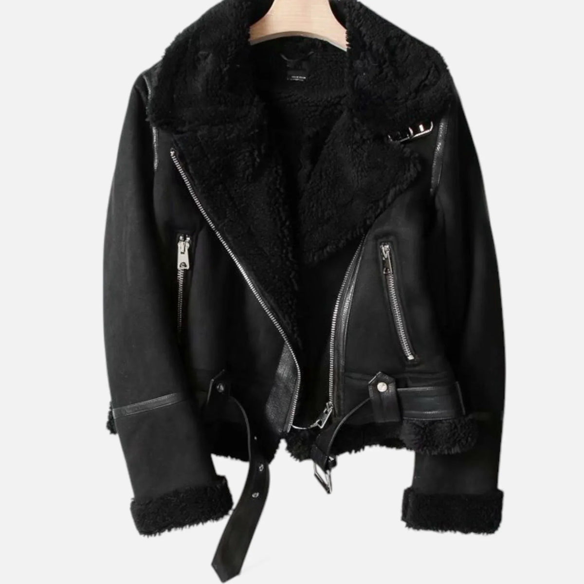 A black suede shearling aviator jacket with a belted waist, asymmetric zip front, and plush shearling lining, shown flat