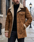 Brown suede shearling jacket for men with plush collar, button front, utility pockets, and warm lining, worn by a male model