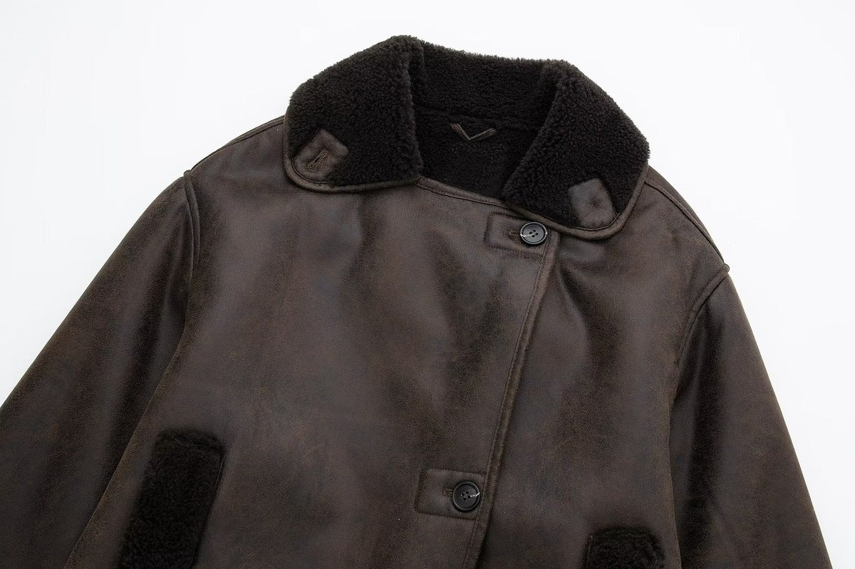 Dark Brown suede shearling jacket close-up showing the plush collar and front button details